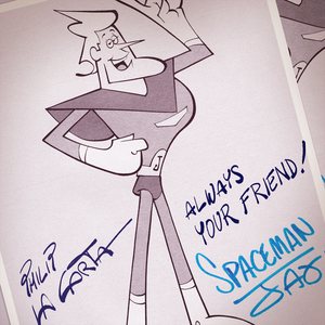 Image of an double autograph, signed by 1960s animated TV show character Spaceman Jax, and the production designer who created him, Philip La Carta. Image www.curioandco.com