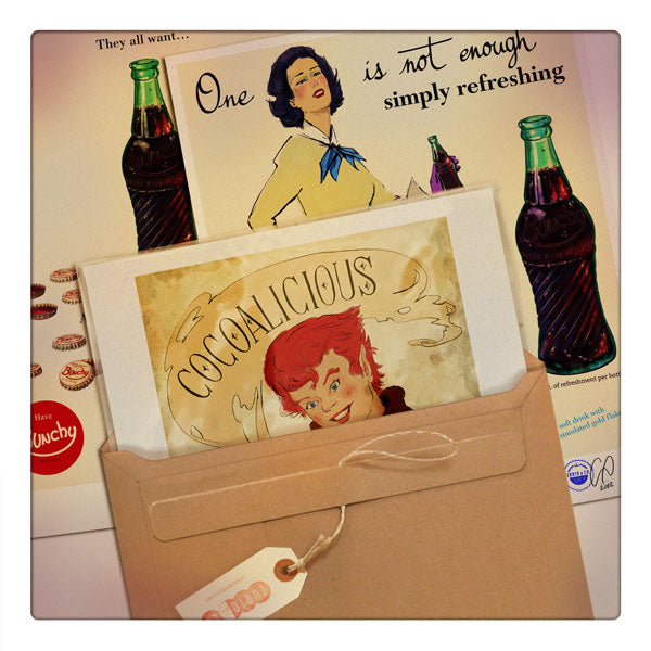 Curio & Co. looks at packaging. Envelope with Bunchy and Oberfaffendorfer ads. Curio and Co. www.curioandco.com