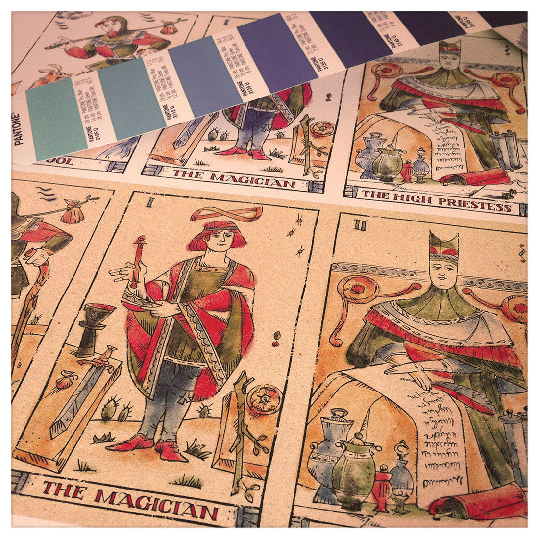 Behind-the-scenes look at how the Musterberg deck of tarot cards are made, showing production proof and pantone color swatches. Image courtesy Curio and Co. www.curioandco.com