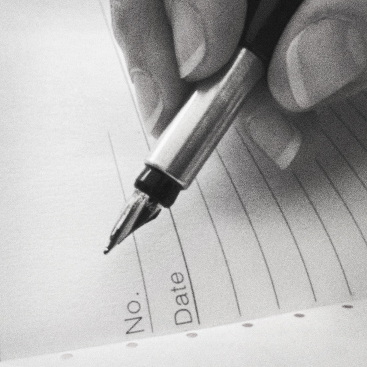 Grainy black-and-white close-up of a fountain pen hovering over the first lined page of an open notebook, the top two lines printed with "No." and "Date."