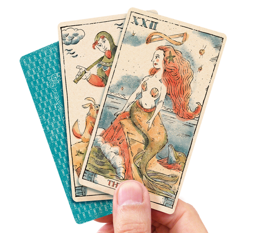 Three Tarot of Musterberg cards held by man's hand back of cards and Fool and Siren cards facing up.