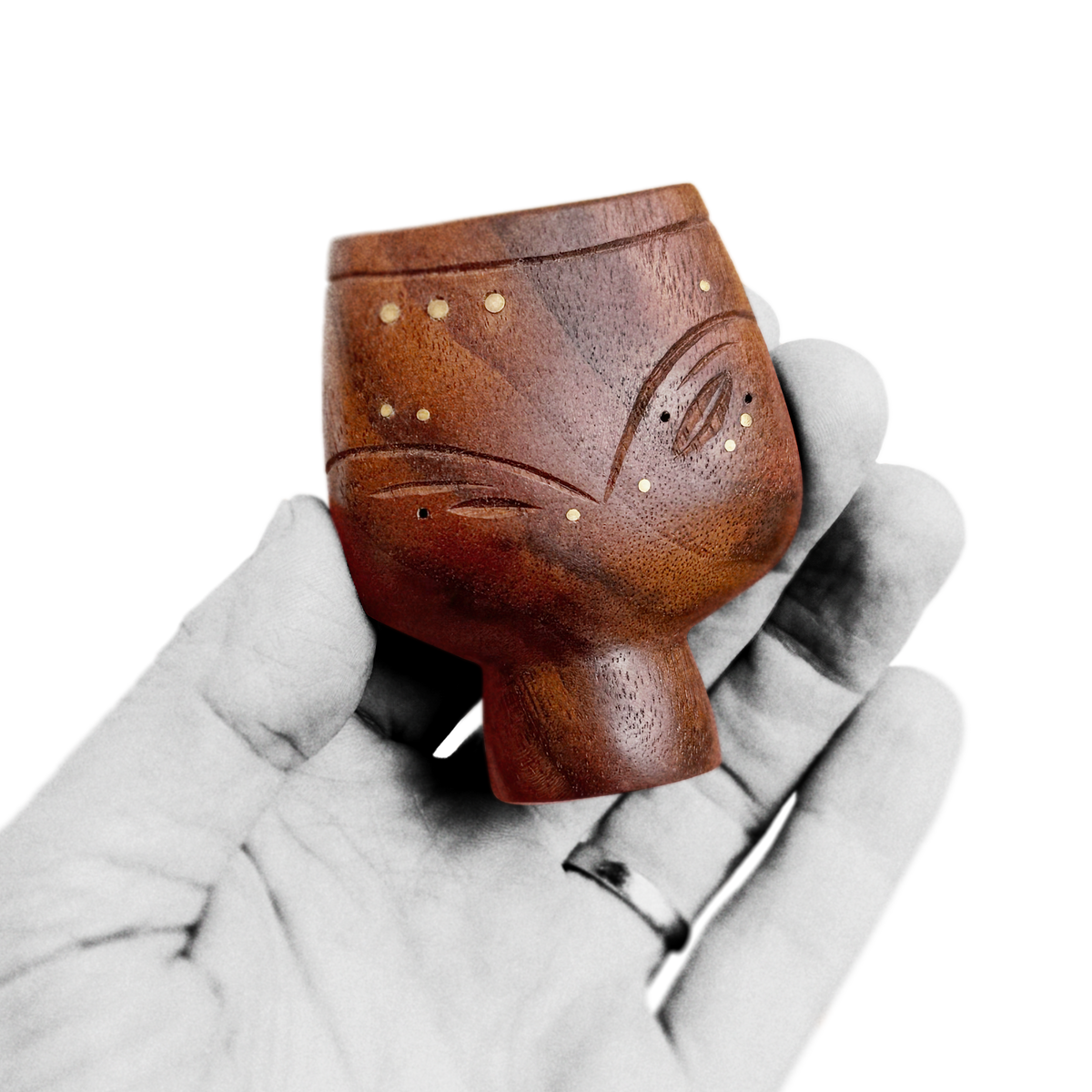 Hand holding black walnut chocolate brown mid-century design style figure with brass inlay about 6 cm heigh