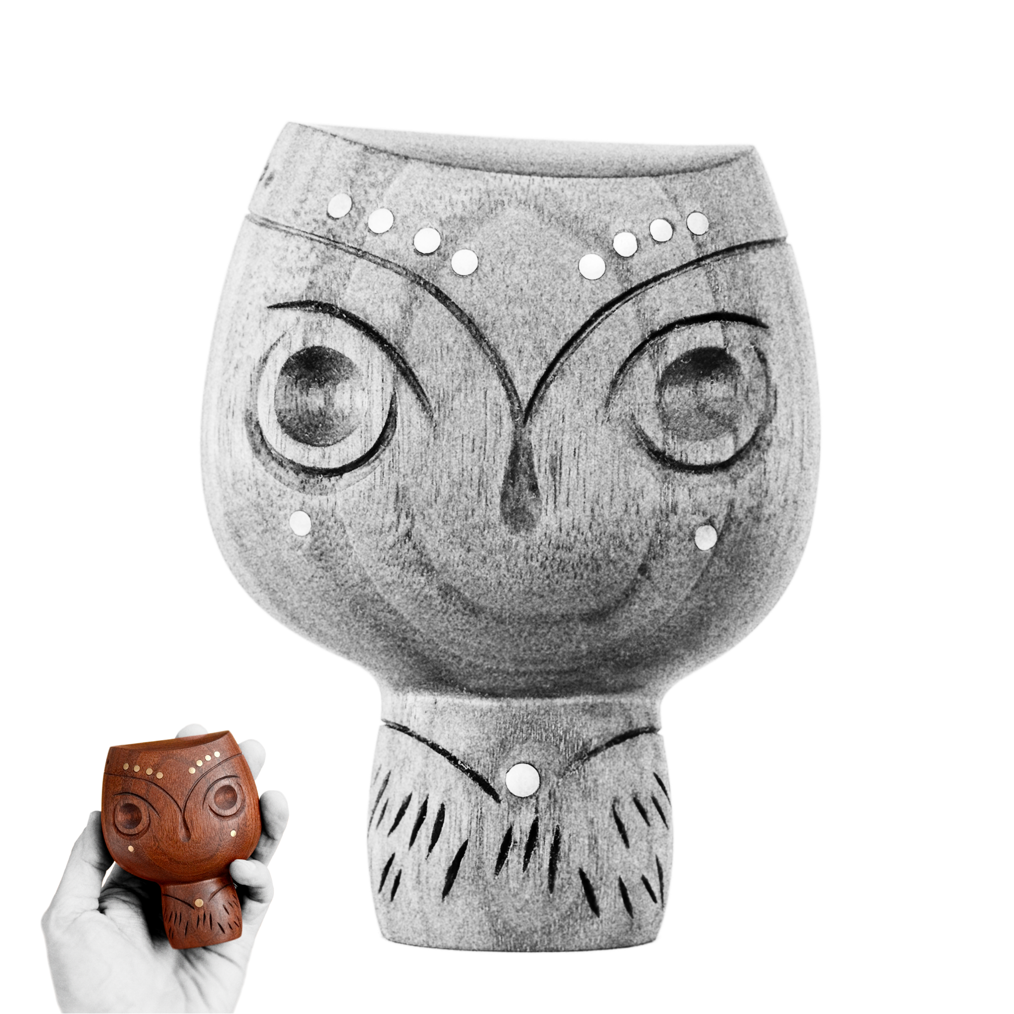 Black and white wood owl figure, and hand holding the figure in chocolate brown walnut color